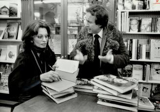 It's love: Investment councillor Wayne Tanenbaum cut short a trip in New York City to return to Toronto and be near Sophia Loren today as she signed books in a downtown store