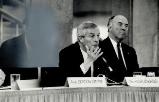 Free trade advocates: Former Alberta Premier Peter Lougheed and former finance minister Donald Macdonald, right, were speaking yesterday as co-chairmen of the Canadian Alliance for Trade and Job Opportunities