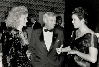 Former Alberta premier Peter Lougheed chats with gala chairman Gail Halpin, left, and manager of business relations Diana McKay.