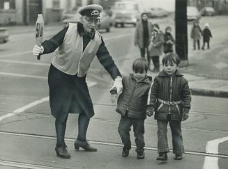 87 years old, Viola Lowe is unchallenged as the city's senior crossing guard, getting children safely across King and Niagara Sts