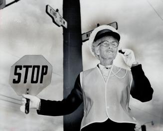 Crossing guard Viola Lowe is 85. But after 21 years on the job she still thinks it's great.