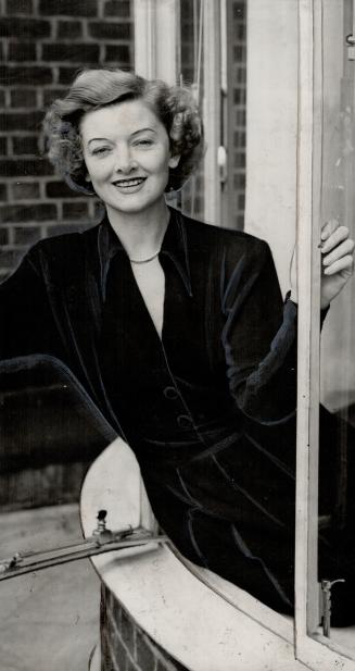 Myrna Loy, hailed as the screen's perfect wife, is in London. She will star in U.K. film Autumn Violins