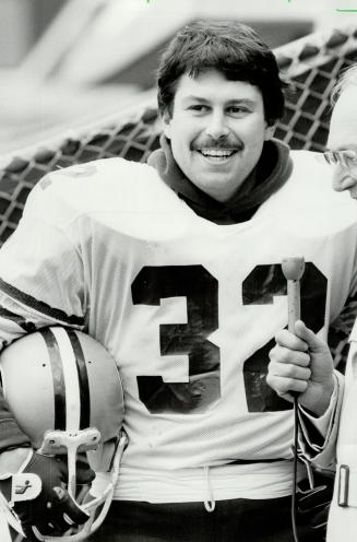 Neil Lumsden, left, and Dave Cutler, two former Edmonton Eskimos, are believed to be finalists for role as analyst on CFL's television productions this season