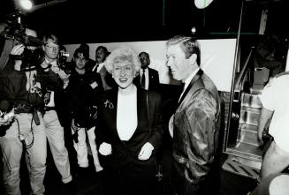 Kim Campbell and incumbent A.C. candidates David Macdonald at Toronto Film Festival opening gala during election campaign. [Incomplete]