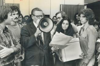 York University president Ian Macdonald talks to students who occupied his office to protest strike