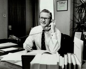 Busy president: Ian Macdonald, 52, is always on the go, working in his office at York Unviersity or letting off steam with his weekly hockey game, which is as much a part of his life today as it was back in 1973 when the photo at right was taken