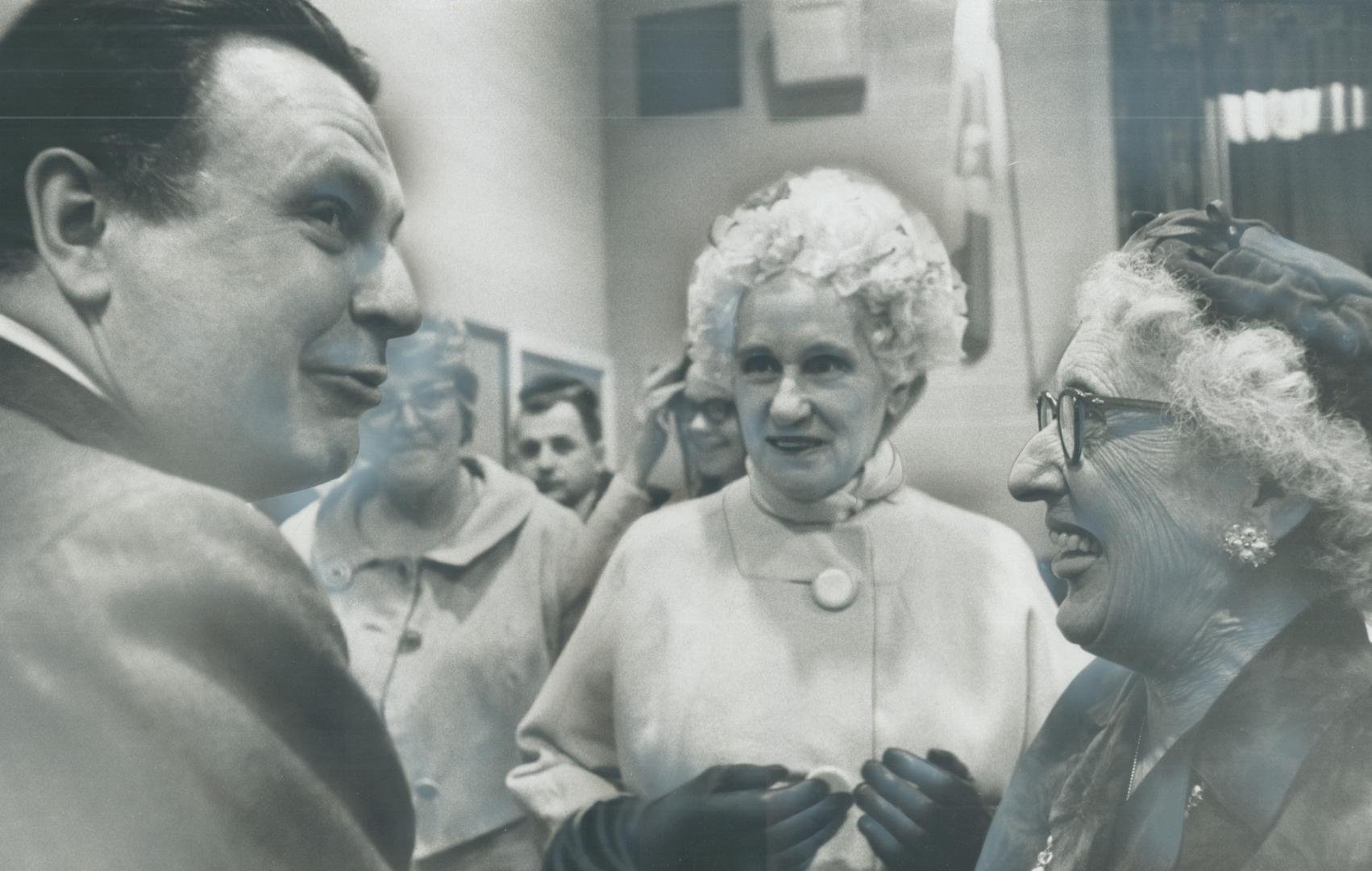 Leadership candidate Health Minister Allan MacEachen talks with Mrs