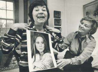 Mandy Scott, victim of an incurable disease, shows picture of her sister, actress Hollis McLaren, as their mother, Stevie Scott, watches