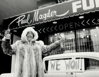 Hot victory: Neither rain, nor sizzling heat stops Toronto retailer Paul Manager from donning a fur coat from his Spadina Ave