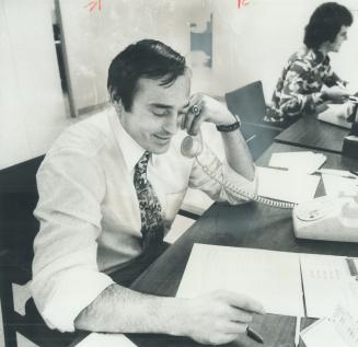 Frank Mahovlich at work. Toros' stars doing a selling job.