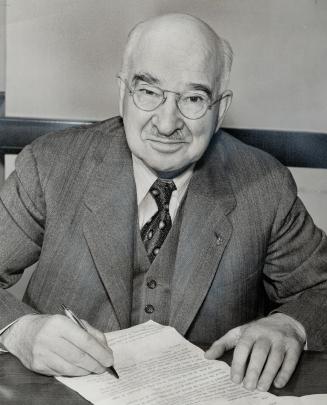 Retired editor-in-chief George H. Maitland. At work in his office at The Star prior to his retirement