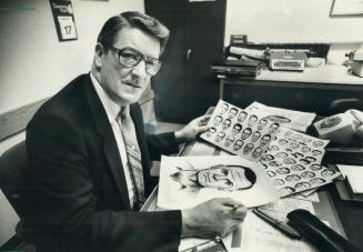 Process of elimination: Police inspector Jim Majury, who has been making composite drawings of suspects for 23 years, starts by showing witnesses photographs illustrating different facial shapes