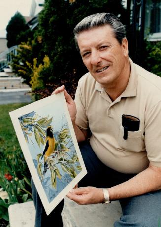 Wildlife artist: Retired Metro policeman Jim Majury, 56, of Scarborough, displays one of the paintings that has made him a renowned wildlife artist