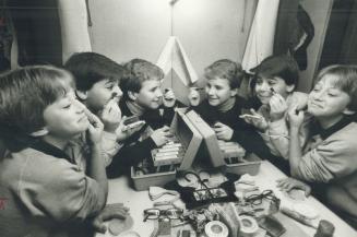 A real put-on: The 3 Patricks, left to right, Keram Malicki Sanchez, 10, Zachary Levine, 11 and John Munroe, 11, who alternate the role in the Limelight Theatre's Theatre's production of Auntie Mame, get to do their own make-up, all the chocolate doughnuts they can eat and $25 a performance besides