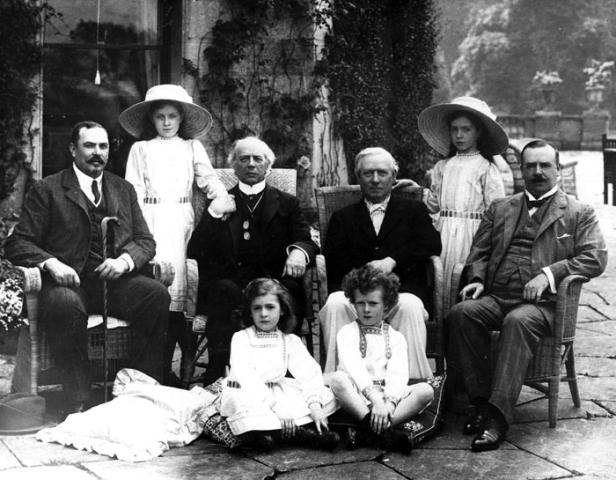 Prime Ministers Louis Botha of South Africa, Sir Wilfred Laurier of Canada, Herbert Henry Asquith of England, and Lord Stanley Melbourne Bruce of Australia, with children