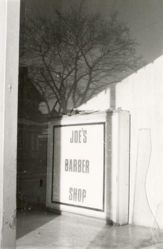 Joe's Barber Shop sign, College Street, north side, between Margueretta Street and St. Clarens Avenue, Toronto, Ont.