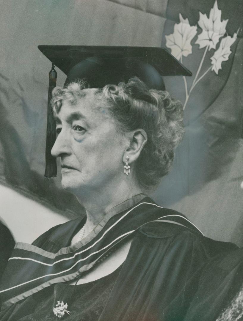 Back to school. East York's Mayor True Davidson, a member of the board of governors of Centennial College, Scarboro, wears scholar's mortarboard at th(...)