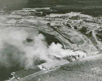 Aerial view from lake of Marathon Pulp Inc. lumber mill