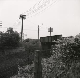 Rogers Road, looking east to bridges over C.N.R. & C.P.R. tracks. Toronto, Ont.