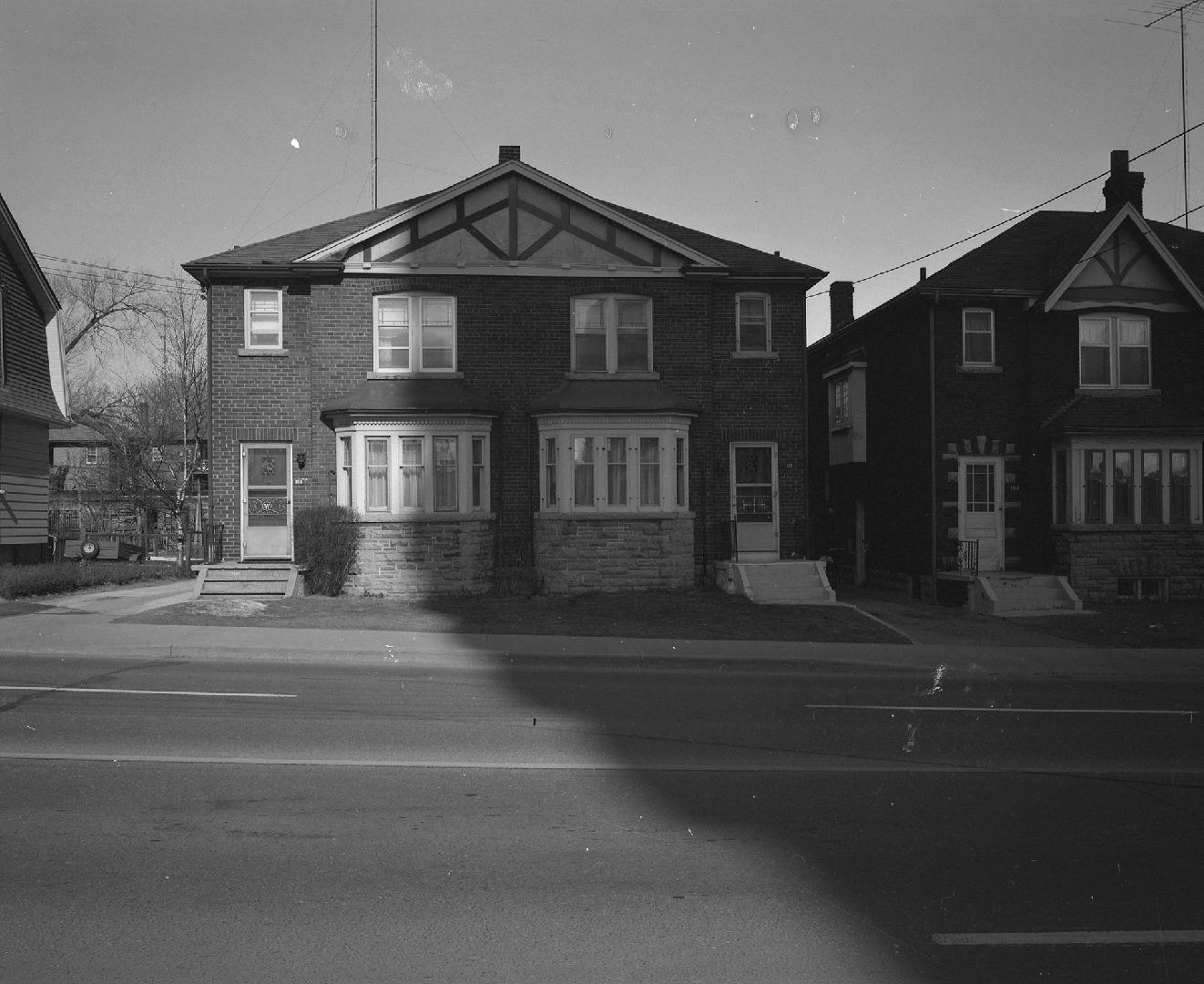 Davisville Avenue, looking north, west of Acacia Road, Toronto, Ontario. Image shows a two stor ...