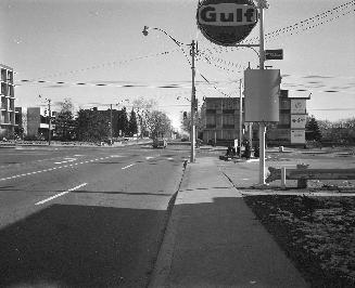 Davisville Avenue, looking east across Mount Pleasant Road, Toronto, Ontario. Image shows a str…