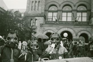 Nuclear disarmament demonstration in front of Parliament Buildings (1893), Queen's Park, Toronto, Ontario.