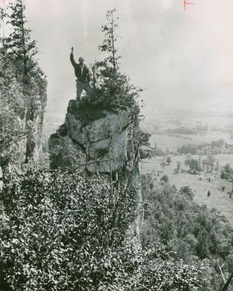 Derek Ford stands on top of Kimberley Rock in Beaver Valley, Ontario