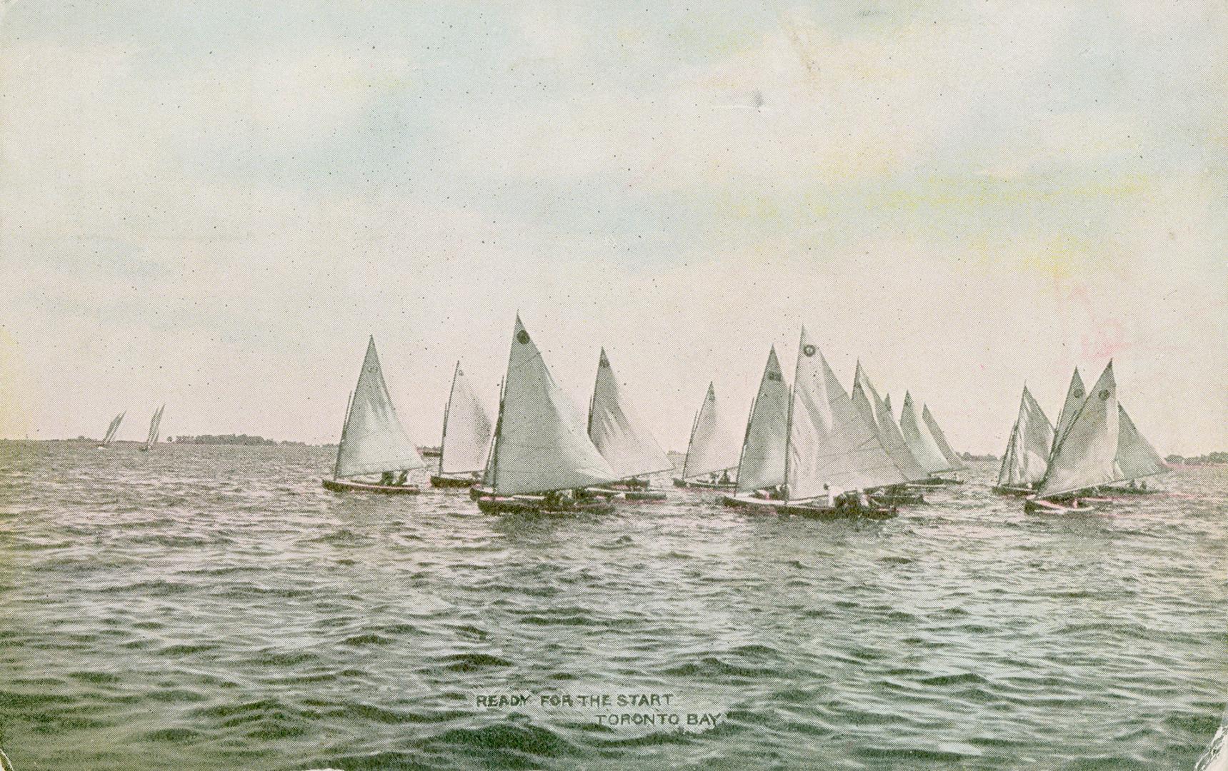 Image shows a number of boats on the lake.