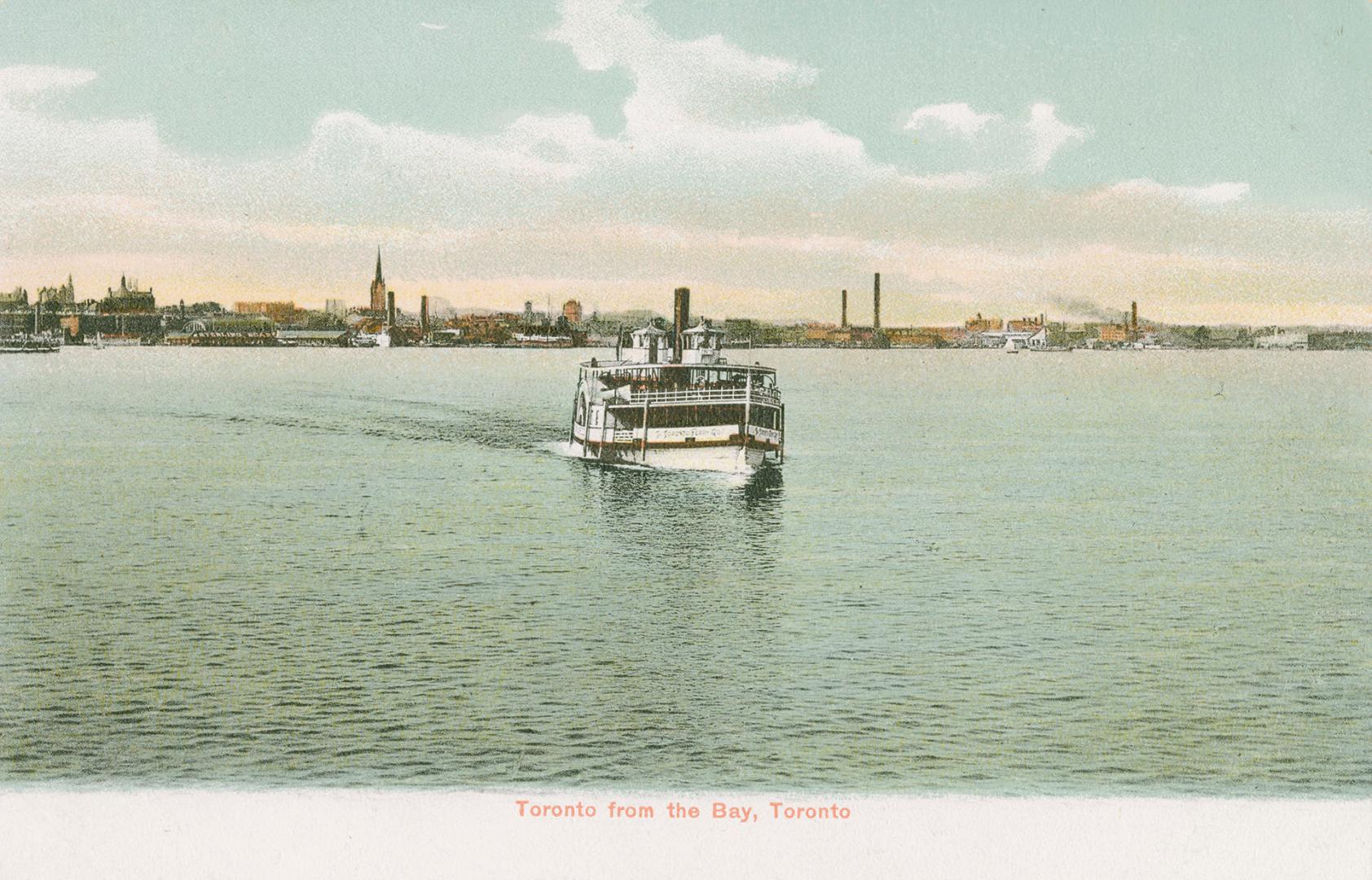 Image shows a boat on the lake with Toronto buildings in the background.