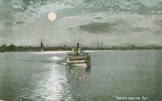 Image shows a ferry on the lake at night in the moonlight with some Harbour buildings in the ba ...