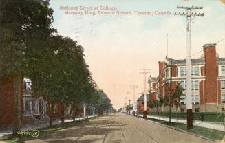 Bathurst Street at College, showing King Edward School, Toronto, Canada.