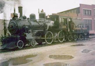Steam locomotive outside of Canadian Pacific Railway's John Street roundhouse, Toronto, Ont.