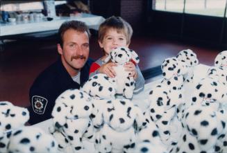 Firefighter Ken Sherman, son Warren, and Sparky the fire dog. Ajax, Ontario