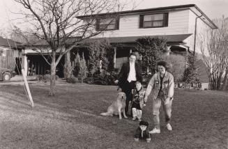 Darrel Berry, wife Louise, children Cadence and Chelsea, in front of their home. Ajax, Ontario