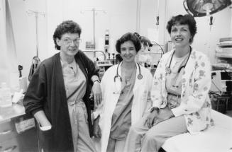 Nurses, Judy Cabel, Janet Roth, and Lisa Landry, at Ajax-Pickering Hospital. Ajax, Ontario