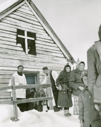 Rt. Rev. Neville Clarke and Indigenous parishioners at Pineimuta in Moosonee, Ont.