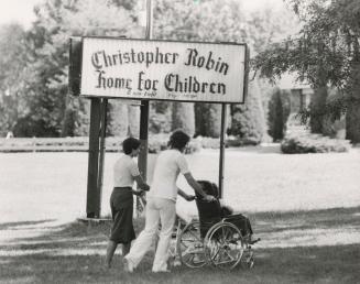 Christopher Robin Home for Children, youngsters in wheelchairs taken for a walk. Ajax, Ontario