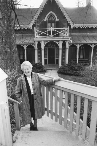 Edith Nora Hillary in front of her house, Aurora, Ontario