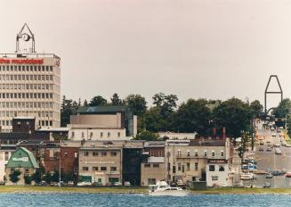 Skyline of Barrie, Ontario from Kempenfelt Bay, Lake Simcoe, with old city hall monument.
