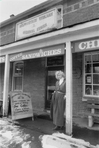 Judy Charbonneau in front of Belfountain Village Store. Belfountain, Ontario