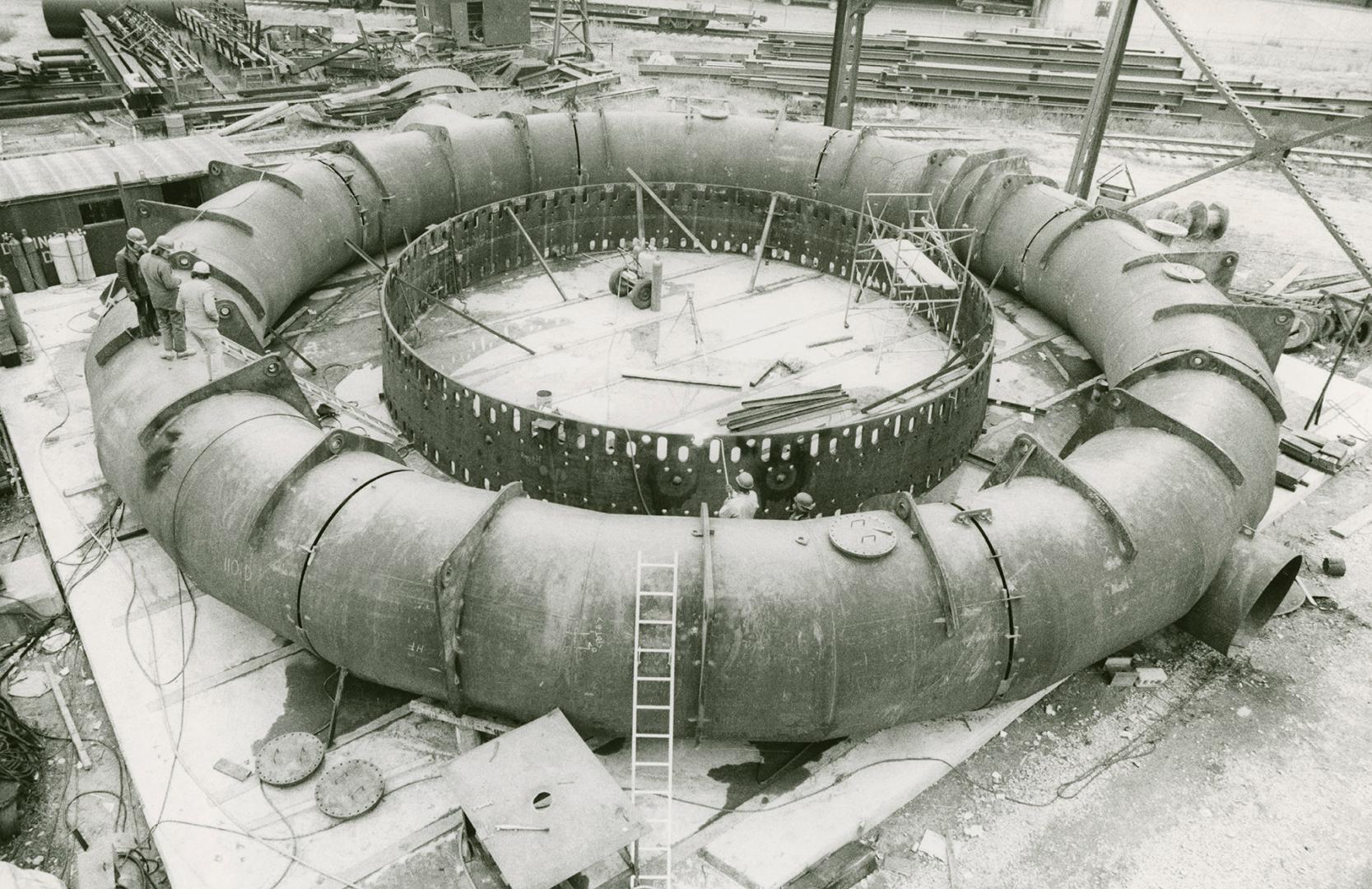 Assembly of bustle pipe for blast furnace at Dominion Bridge Company steel plant in Nanticoke, Ont.