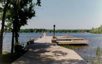 Kelly Reynolds strolls on swimming docks at Port 32, on the shores of Pigeon Lake. Bobcaygeon, Ontario