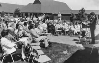 Douglas Leeies, chairman of the Bolton Camp Committee, giving a speech at the official opening of the Ruth Atkinson Hindmarsh Family Life Lodge at the Bolton Conference Centre, Bolton Camp. Bolton, Ontario