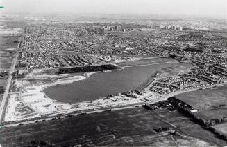 Aerial view of Professor's Lake surrounded by homes. Brampton, Ontario