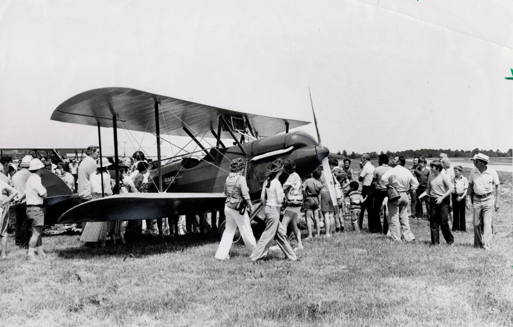 A Waco biplane admired by visitors at the Canadian Aircraft Historical Society Museum. Cheltenham (Caledon), Ontario