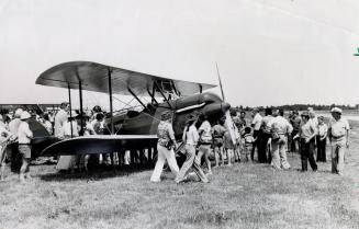 A Waco biplane admired by visitors at the Canadian Aircraft Historical Society Museum. Cheltenham (Caledon), Ontario