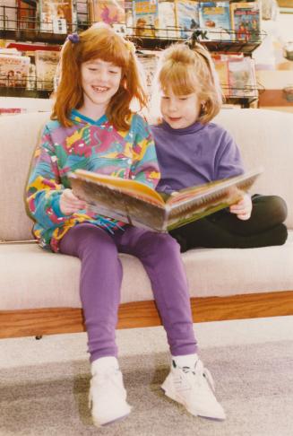 Kayley Richardson and Megan McClelland reading at Parkway Public School. Brampton, Ontario