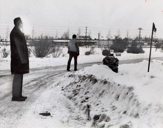 19-year-old convict Bill Thompson walking to school, being watched by the warden. Ontario Training Centre, Brampton, Ontario