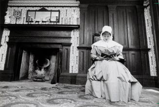 Historical interpreter Margaret Graham in the parlor of the Ireland House at the Oakridge Farm Museum. Burlington, Ontario