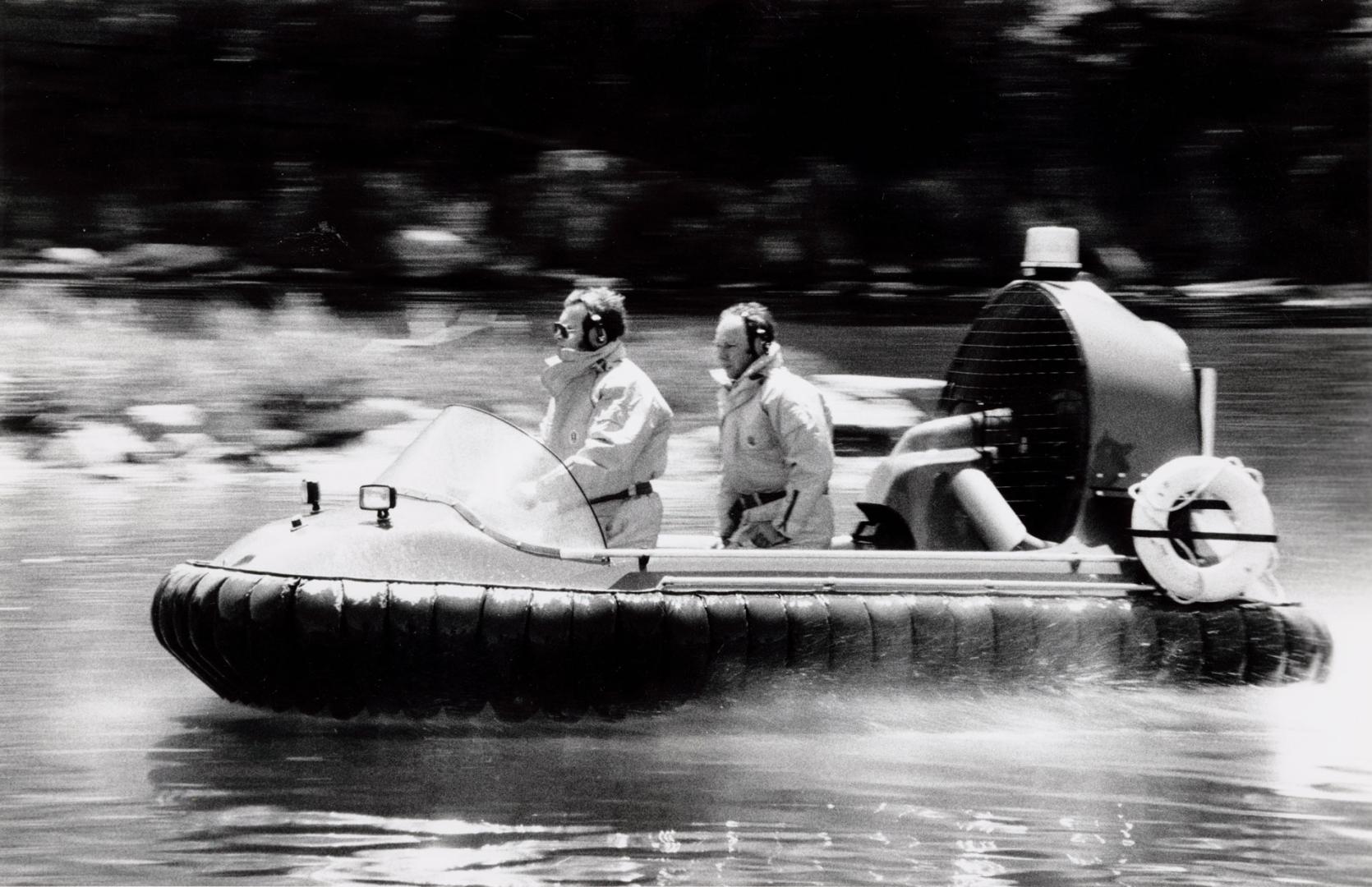 Capt. Brian Pinder watches as firefighter [illegible] Tinker drives the Hoverguard. Cambridge, Ontario